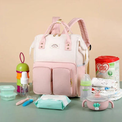 sac a langer de luxe design elegant blanc rose pose table affaires bebe poche laterale mouchoir