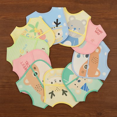 Collections bavoir bébé design mignon toutes couleurs motifs posé table