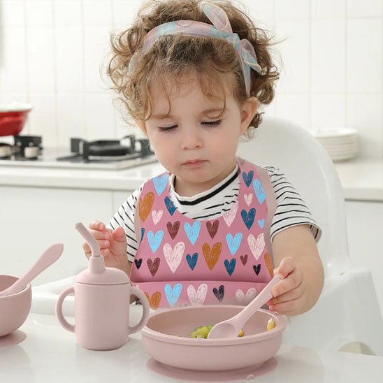 Bavoir-bebe-silicone-design-rose-boutons-pression