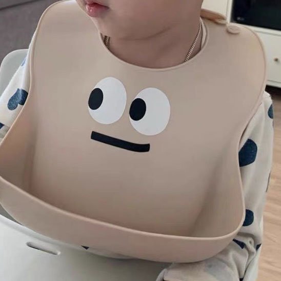 Bavoir-silicone-design-marron-smiley-ergonomique
