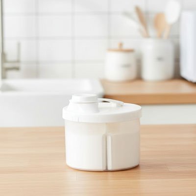 Boite doseuse lait nomade design