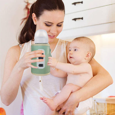 Bébé bras maman jouant chauffe biberon portable bébé design vert adaptable chambre