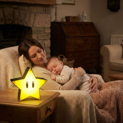 Bébé endormi avec etoile lumineuse bebe design 3D jaune securitaire campagne