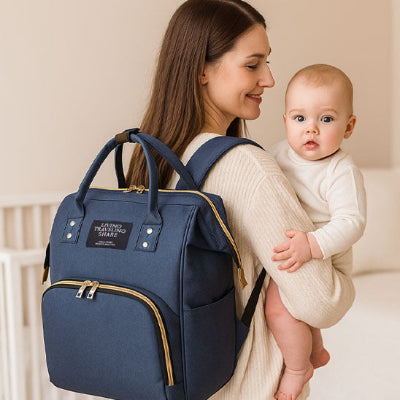 bebe bras maman portant sac a langer de luxe design bleu marine rangements spacieux