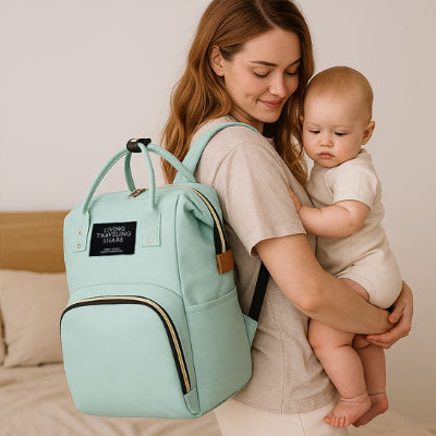 bebe bras maman portant dos sac a langer de luxe design vert poches multiples