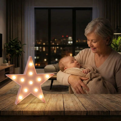 Bébé endormi veilleuse bebe etoile design étoile rose décoration chambre appartement grand-mère