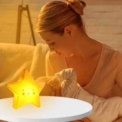 Bébé bras maman avec veilleuse bebe etoile design souriant relaxant sécuritaire salon