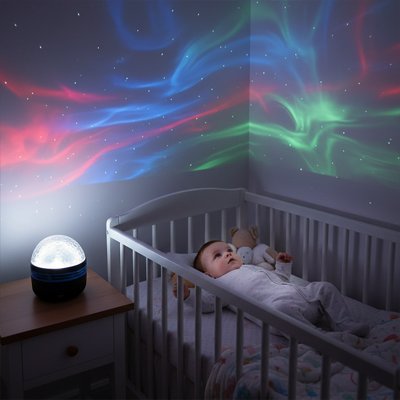 Bébé allongé chambre admiratif veilleuse projecteur bébé port usb